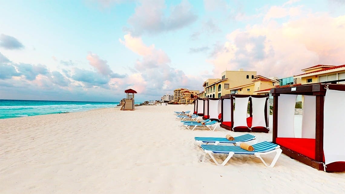 Views of hammocks on the beach at The Villas by Grand Park Royal Cancun