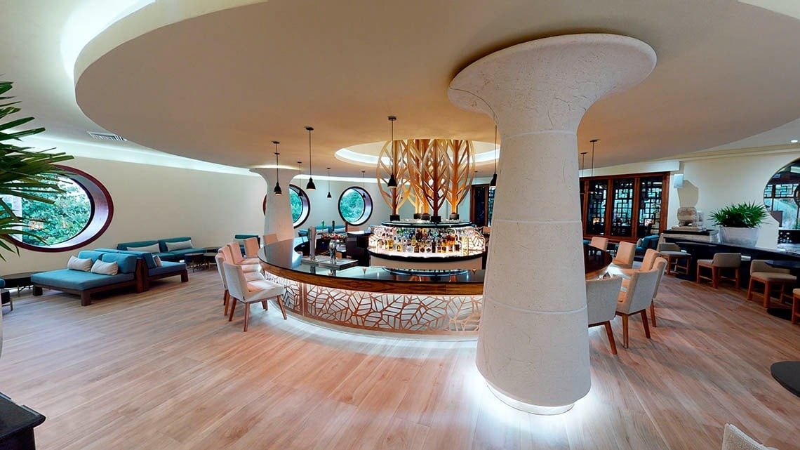 Circular bar with tables and chairs of the Grand Park Royal Cancun Hotel in the Mexican Caribbean