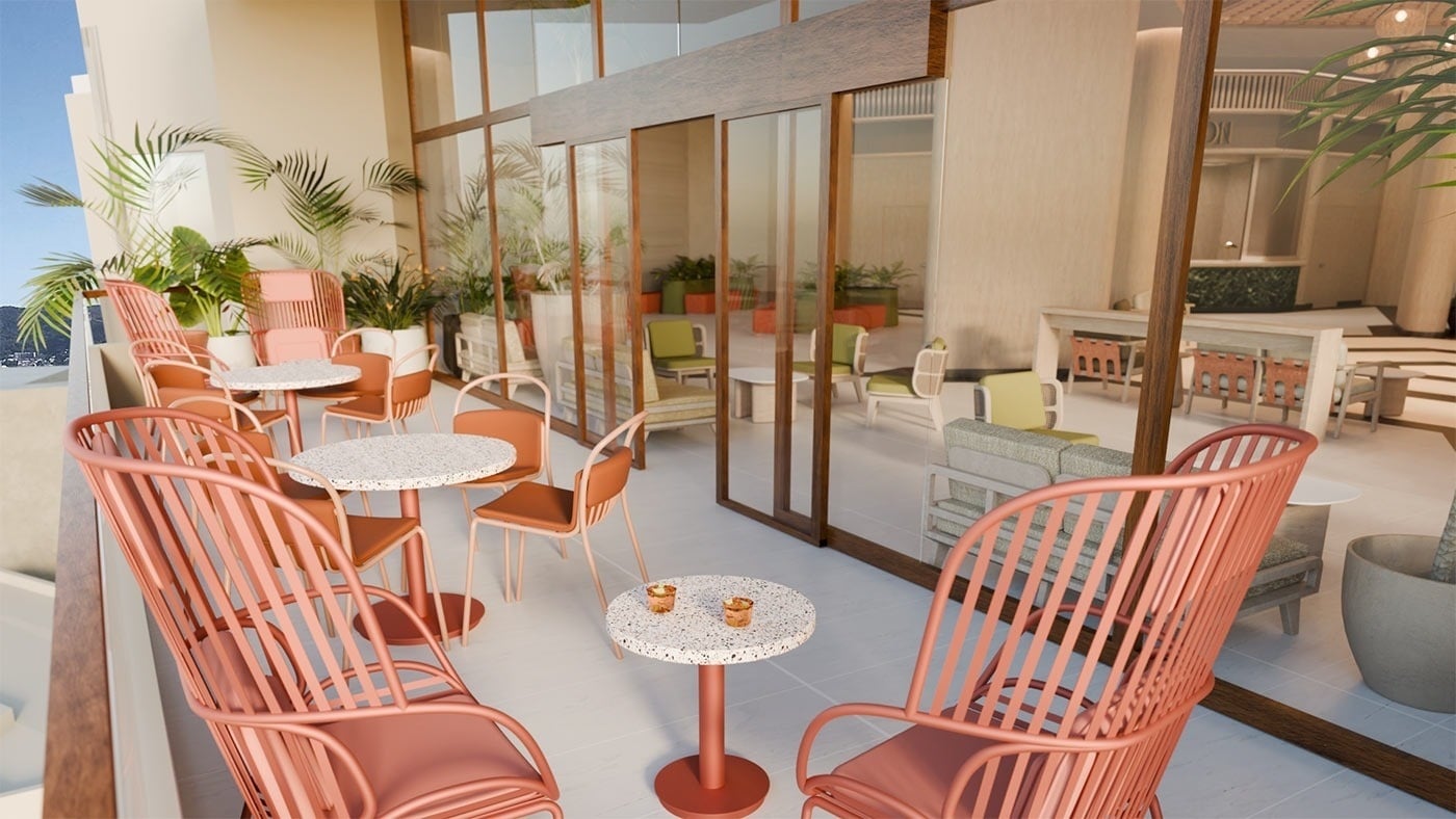Hotel Park Royal Beach Acapulco: Sofás y mesas color coral en terraza con vista al mar.