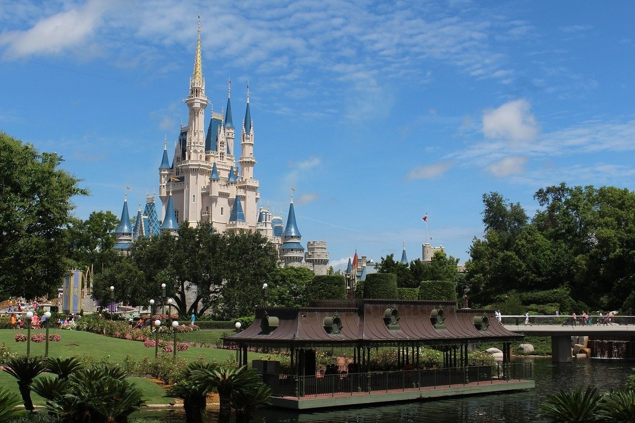 a castle with a boat in front of it