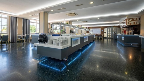 Bright Hotel Pato Amarillo buffet with blue underglow lighting, 4-star hotel in Punta Umbría.