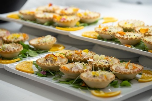 Hotel Pato Amarillo: Fresh, elegant canapés with sprouts & orange slices for a delightful meal in Punta Umbría.
