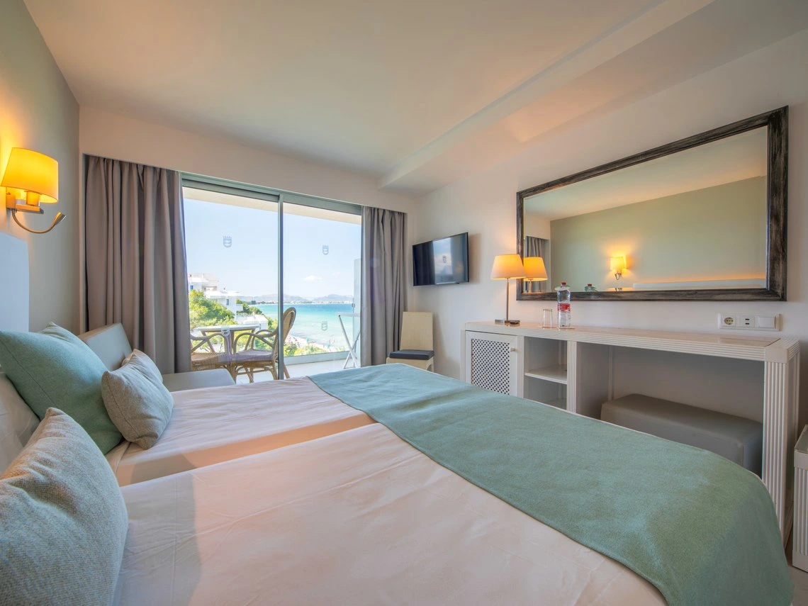 Habitación doble con vista al mar, ideal para un retiro. Playa Esperanza Resort