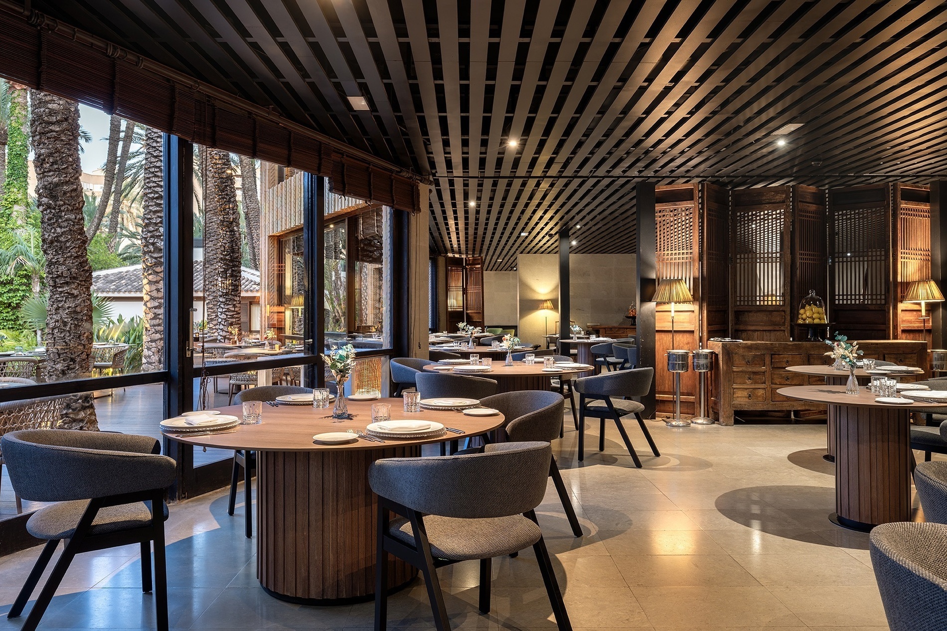 a restaurant with a lot of tables and chairs