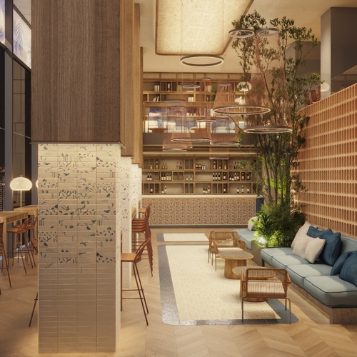 una sala de estar con un sofá y una escalera