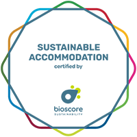 a logo for sustainable accommodation certified by bioscore
