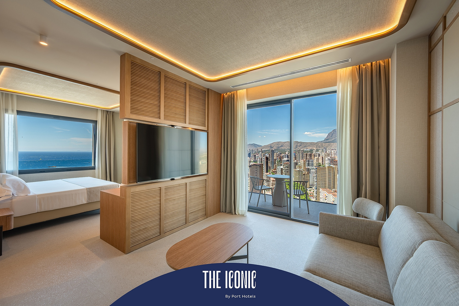 Habitación moderna Port Hotels: Corporativa, cama cómoda, escritorio y armario.