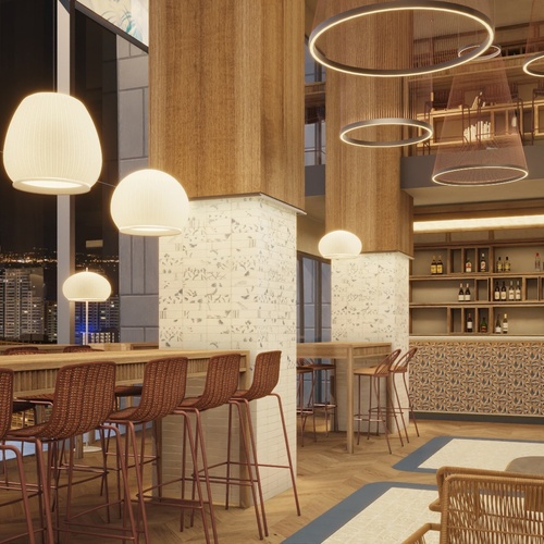 una habitación con muchos taburetes y una barra