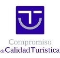 the logo for compromiso de calidad turistica is a blue square with a smile on it .