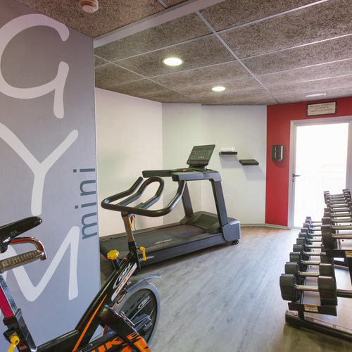 a gym with a sign that says gym mini