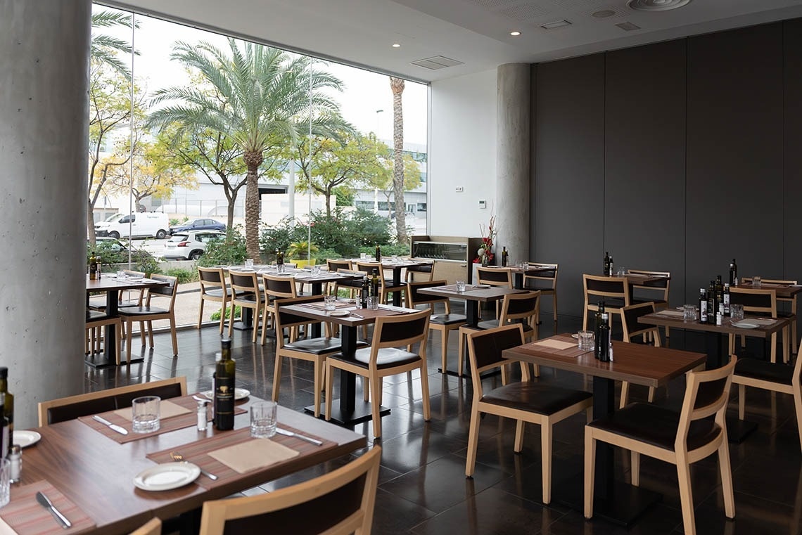 a restaurant with a lot of tables and chairs