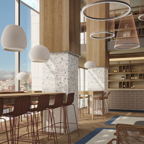 una habitación con muchos taburetes y una barra