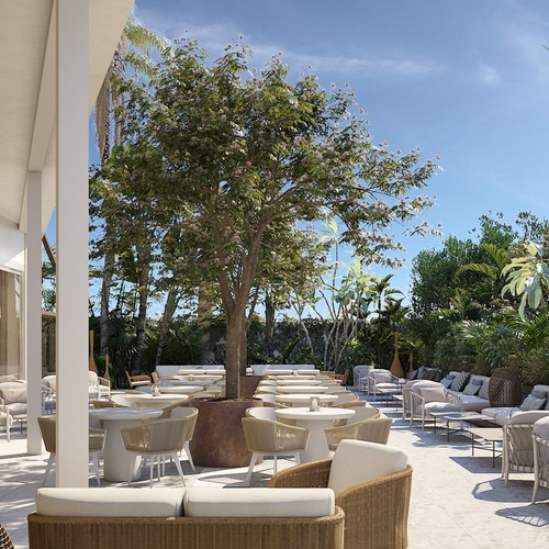 Deck externo e arborizado do Port Hotels: Corporativa com mesas e sofás confortáveis.