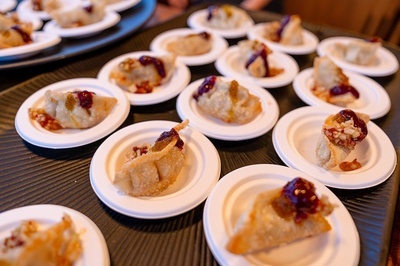 a bunch of small plates of food on a table - 