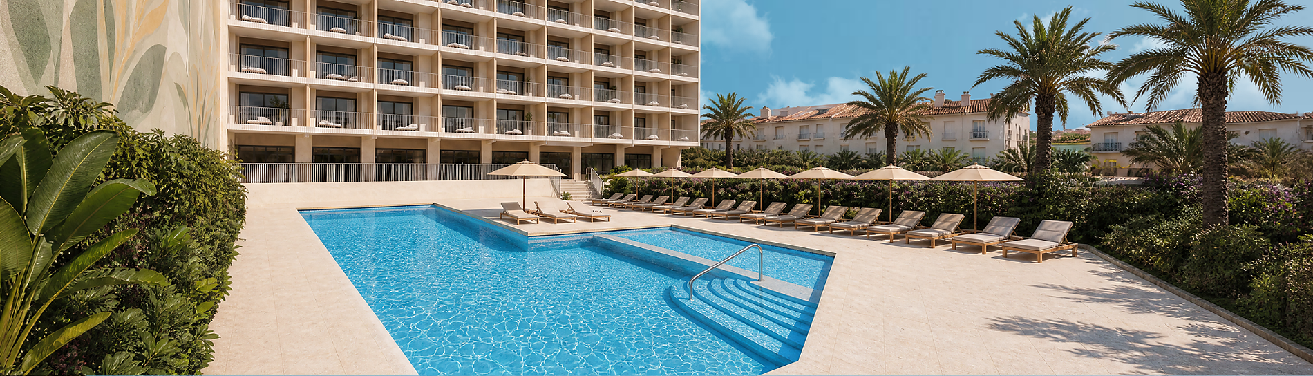 Poolside lounge at Port Alicante City & Beach hotel. Book opening offer!