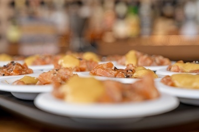 several plates of food are lined up on a table - 