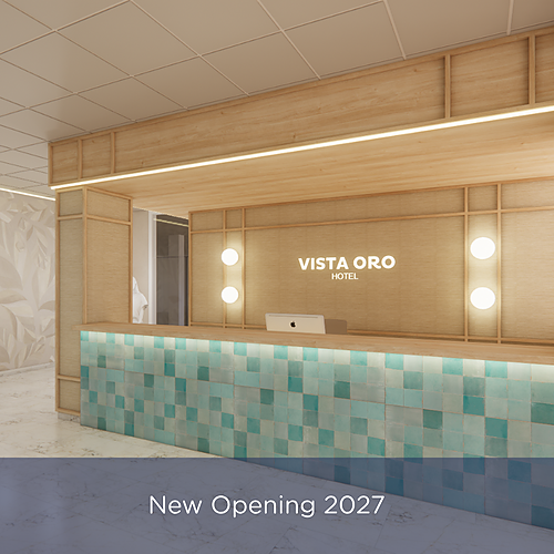 Vista Oro Hotel reception desk with mosaic tiles and 'New Opening 2027' banner, Port Hotels: Corporativa.