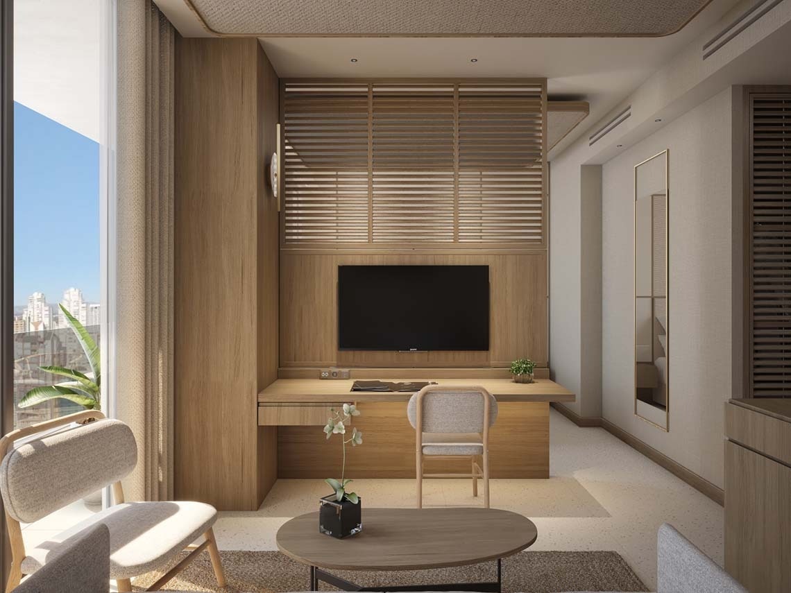 una habitación con una mesa de madera y una televisión