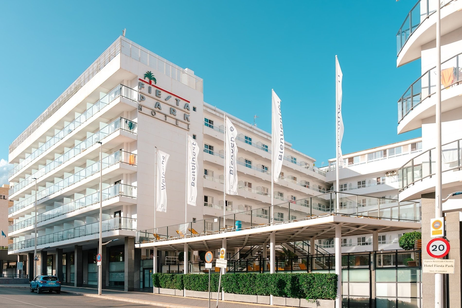 a large white building with the word fiesta park on it