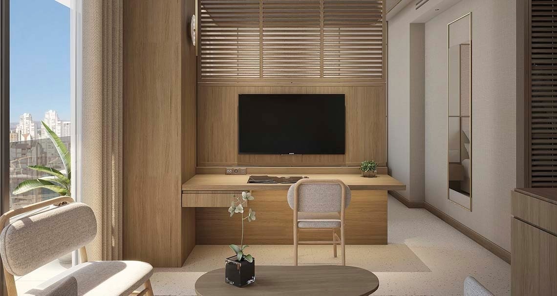 una habitación con un escritorio de madera y una televisión