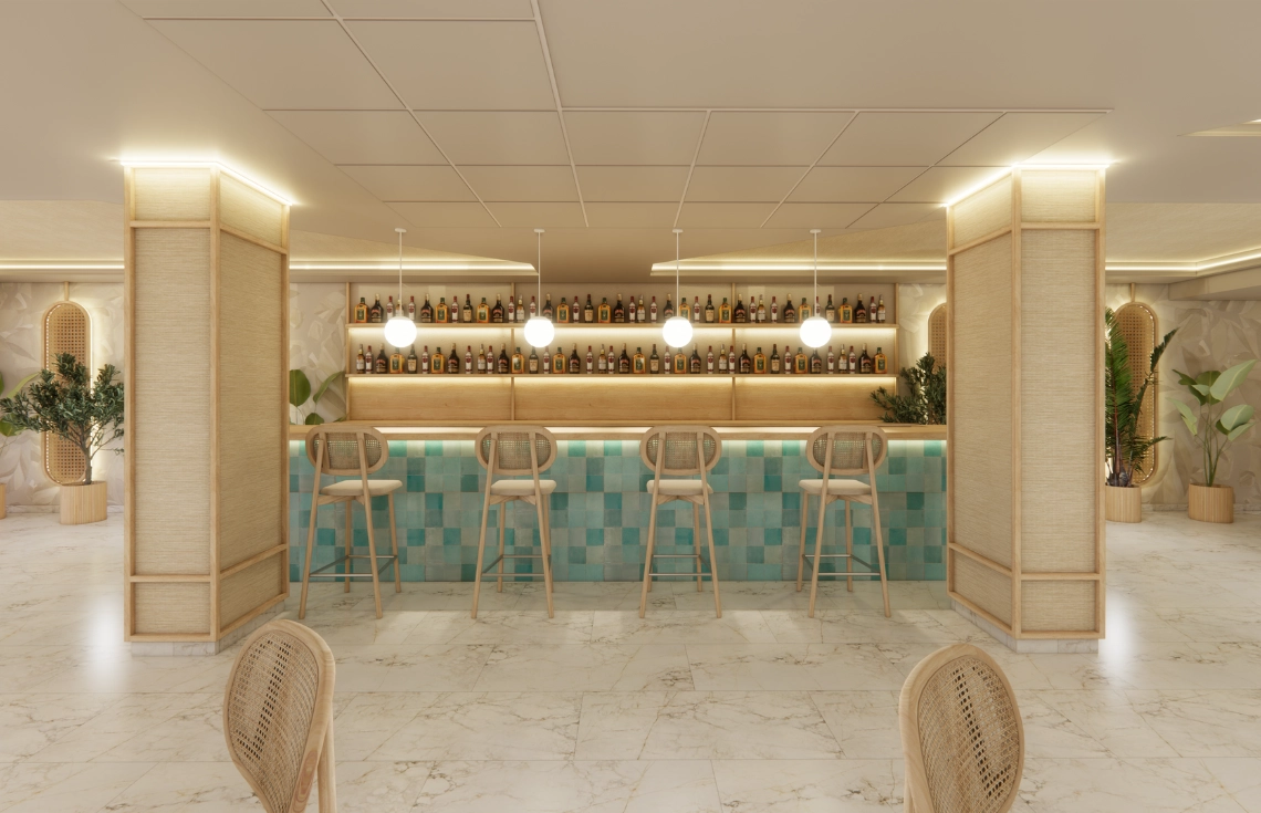 Bar del hotel con taburetes de mimbre, azulejos turquesas y iluminación cálida. Ideal para Port Hotels.