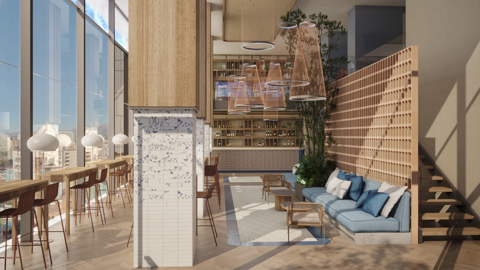 una sala de estar con un sofá azul y una escalera