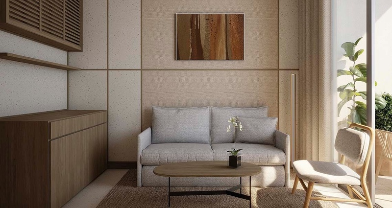 una sala de estar con un sofá y una mesa de madera