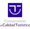 the logo for compromiso de calidad turistica is a blue square with a smile on it .