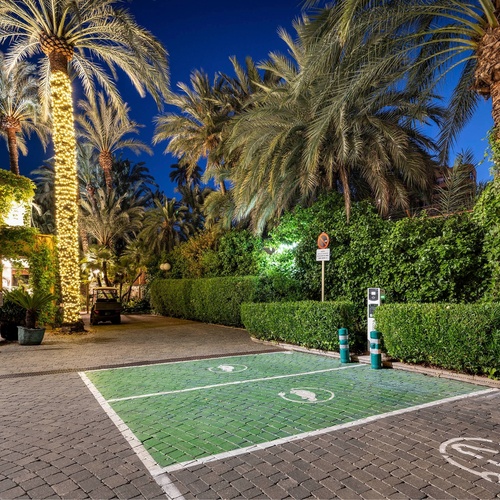 a parking lot with a sign that says no parking