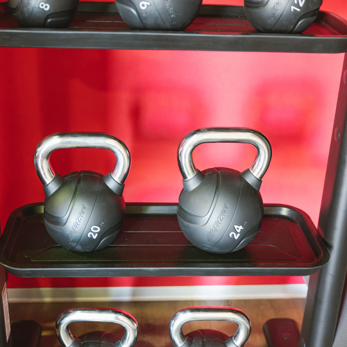 black kettlebells with the number 24 on them