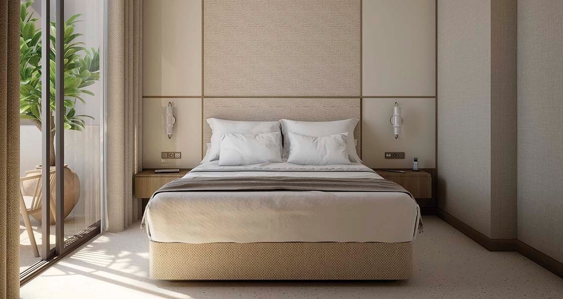 una habitación con una cama y dos mesitas de noche