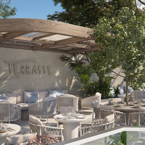 una terraza con mesas y sillas y un letrero que dice la terrasse