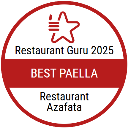 a red and white sign that says restaurant guru 2025 best paella