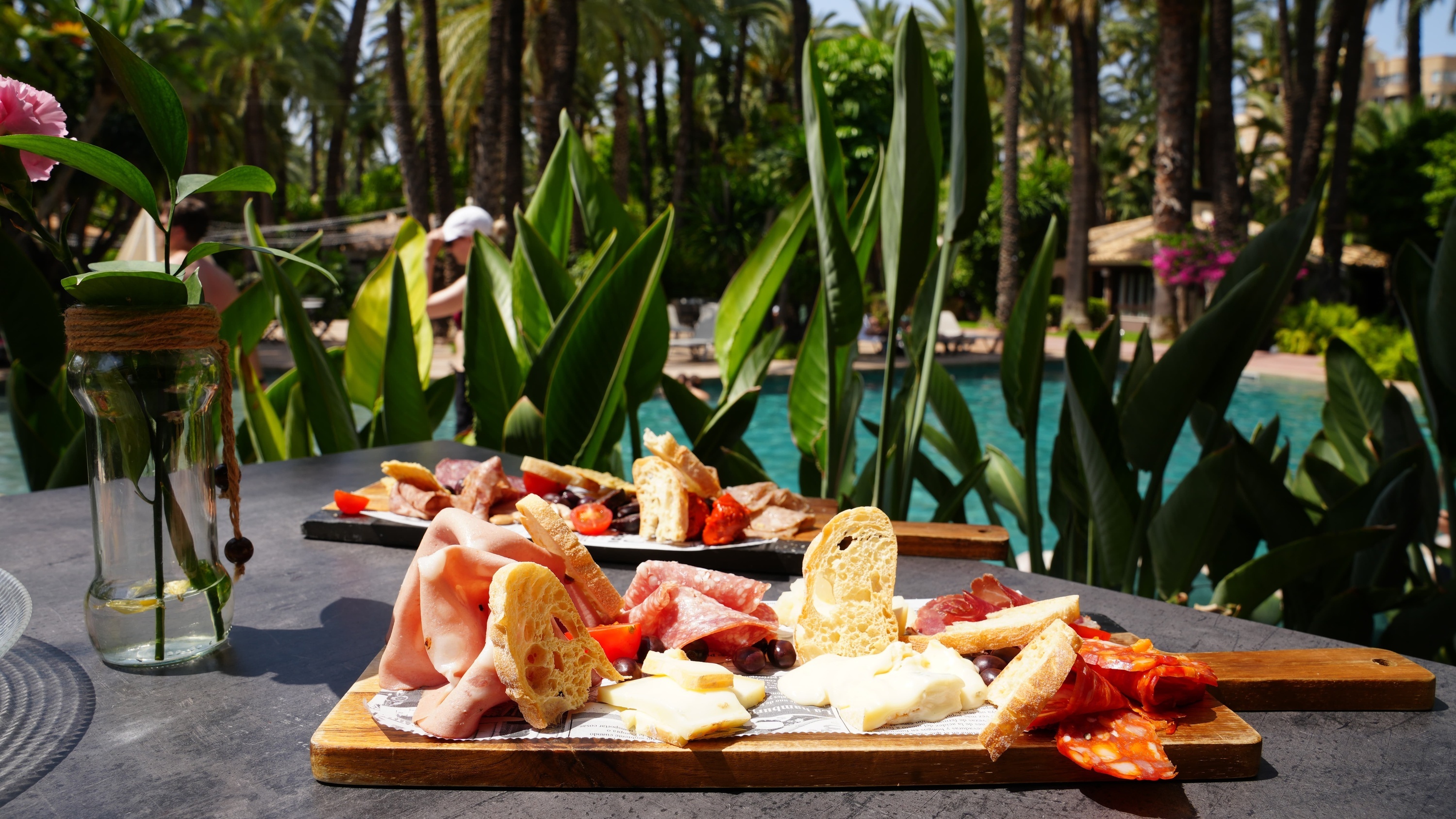 a wooden cutting board with a variety of food on it