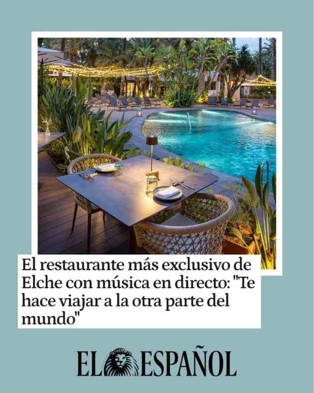 a group of people standing in front of a sign that says bienvenido al verano