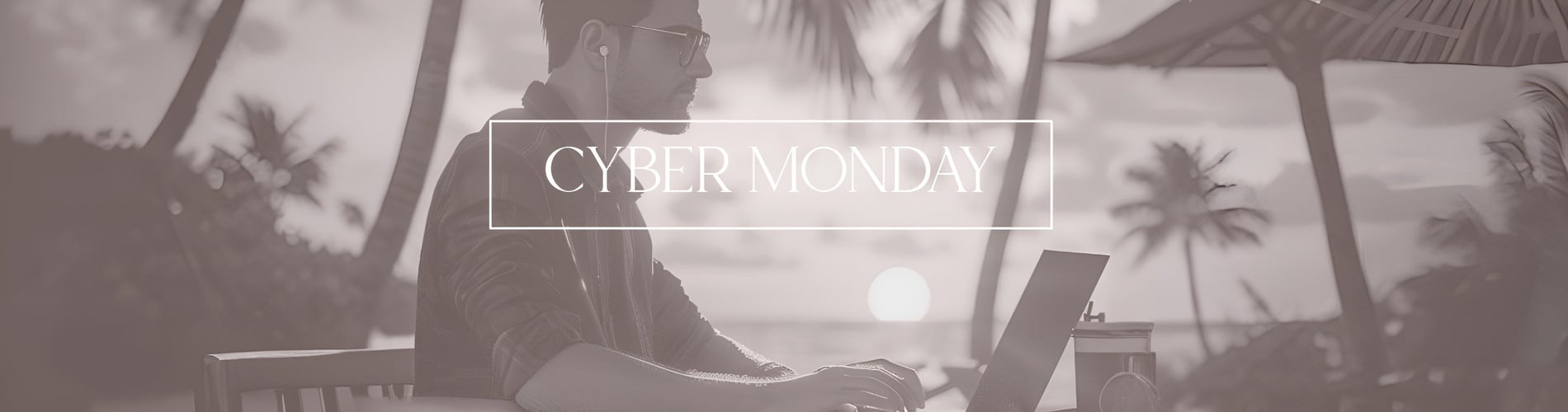 a man is typing on a laptop with the words cyber monday below him