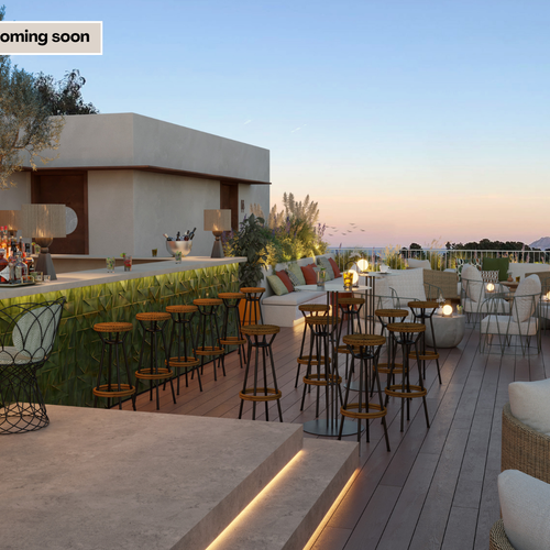 una imagen de un bar con la palabra próximamente a la izquierda