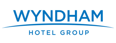 a blue wyndham hotel group logo on a white background