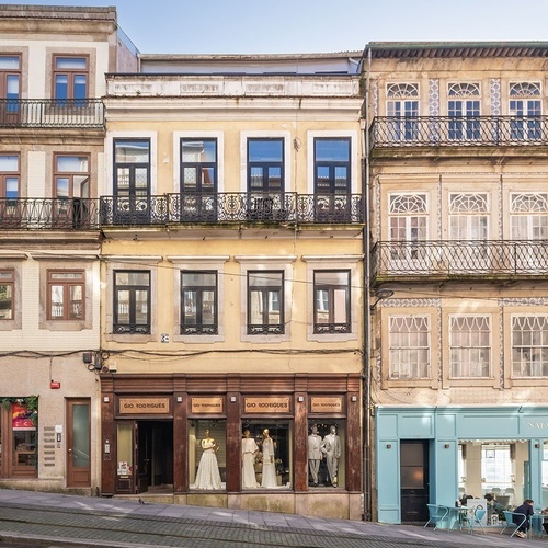 a building with a sign that says boutique on it