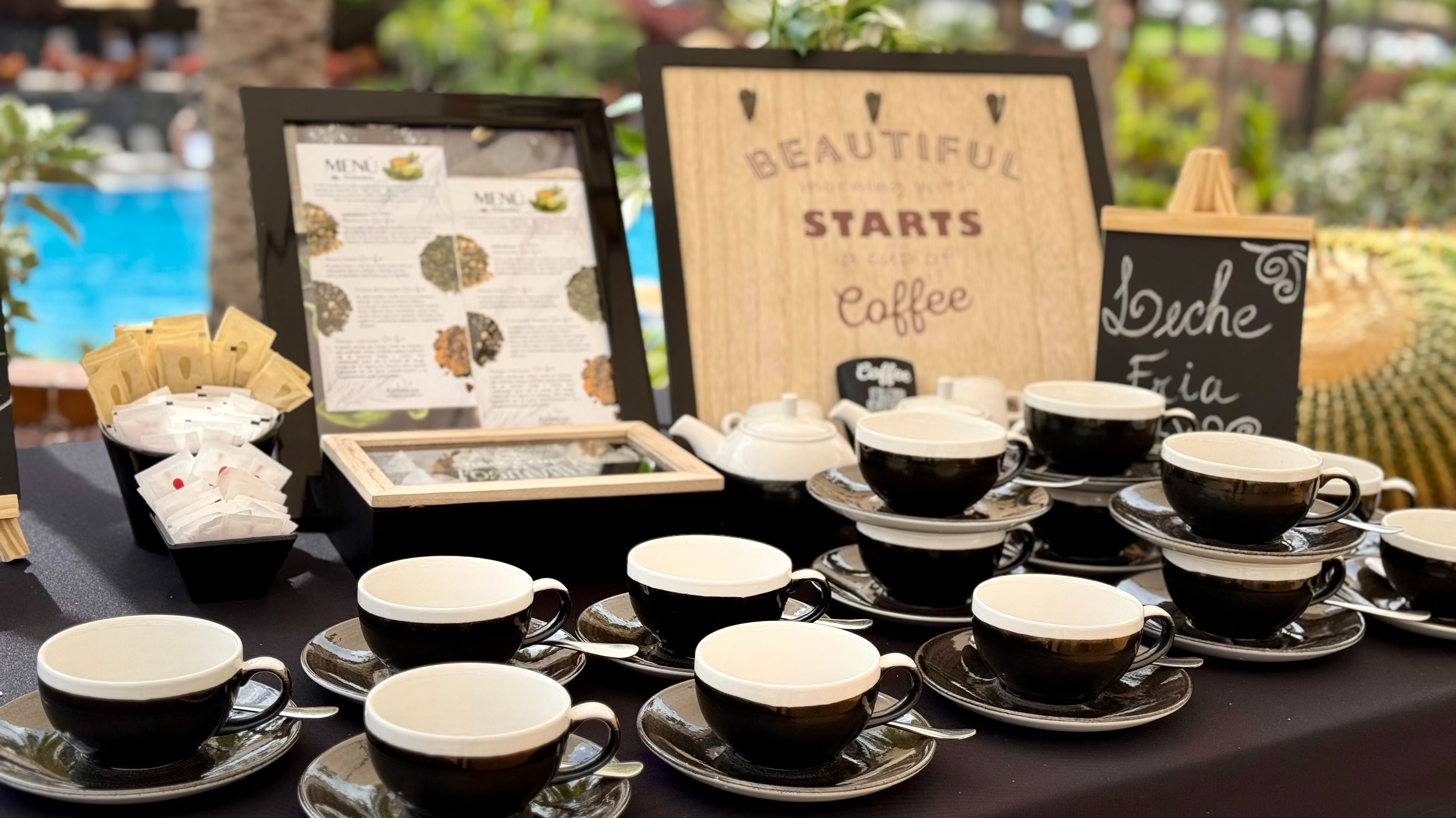 a white plate with a gold rim sits on a table