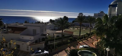 a view of the ocean from a residential area