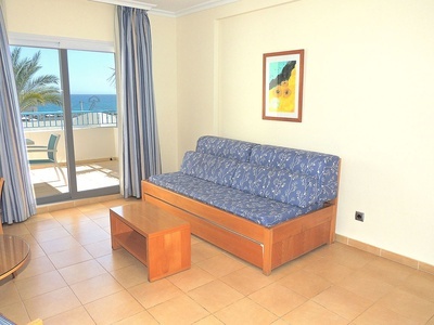 a living room with a couch and a coffee table