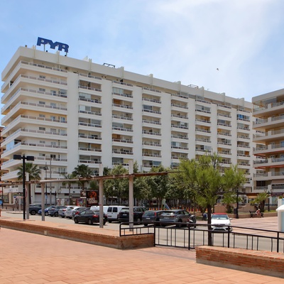 a large white building with the word pvr on the top