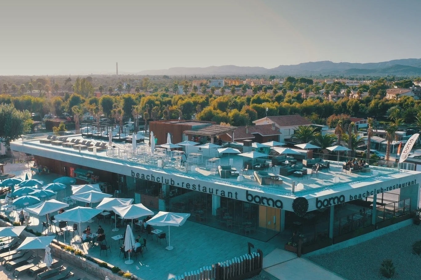 a man and a woman are paddling kayaks on a lake