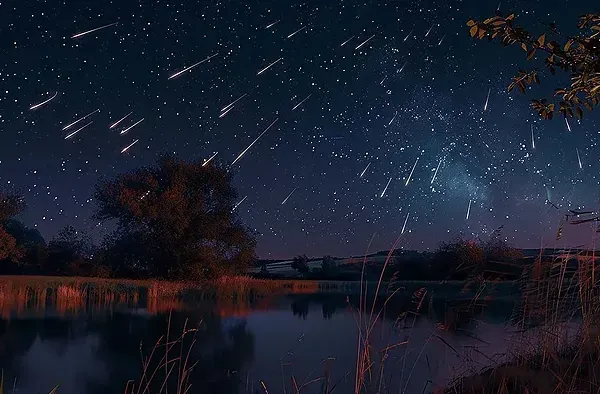 Noche estrellada con lluvia de meteoros sobre un lago tranquilo, ideal para Taiga: Corporativa.