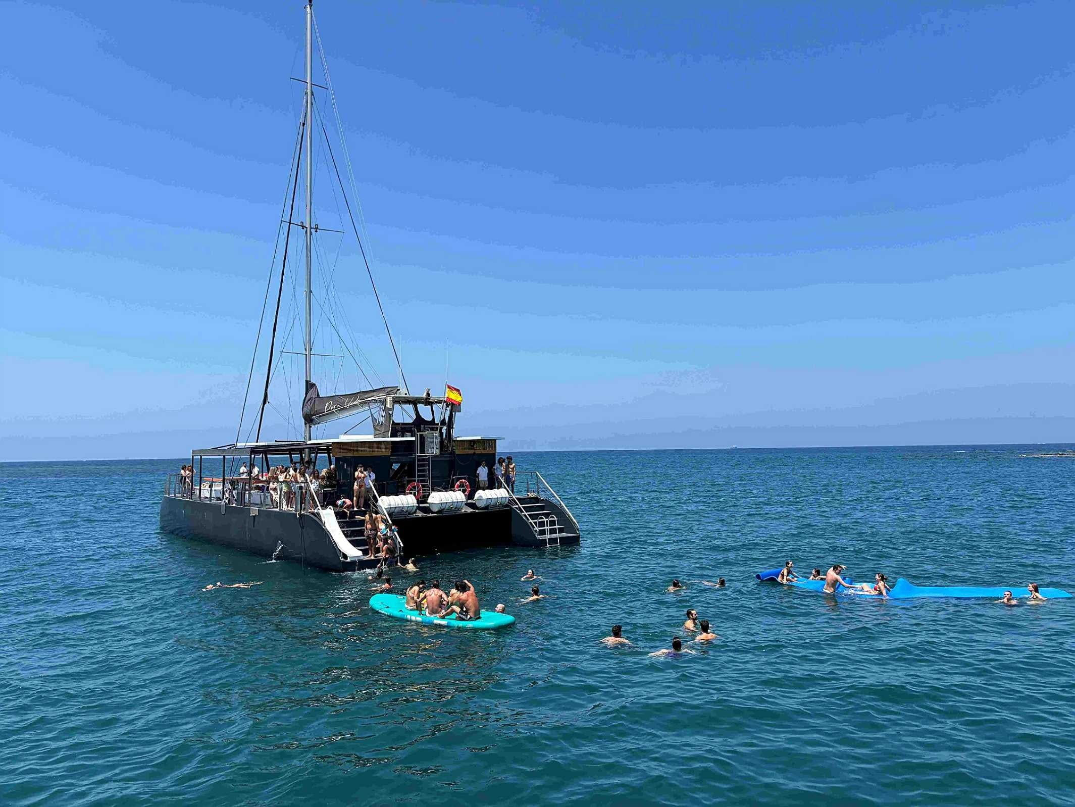 Taiga: Corporativa guests enjoy a catamaran cruise and swimming in the Mediterranean Sea.