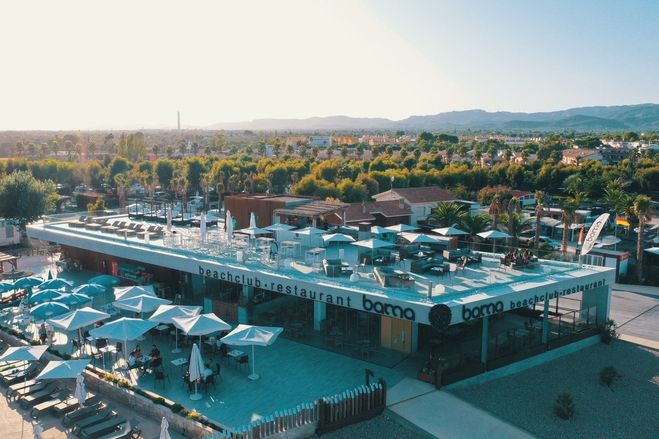 an aerial view of the beach club restaurant bono