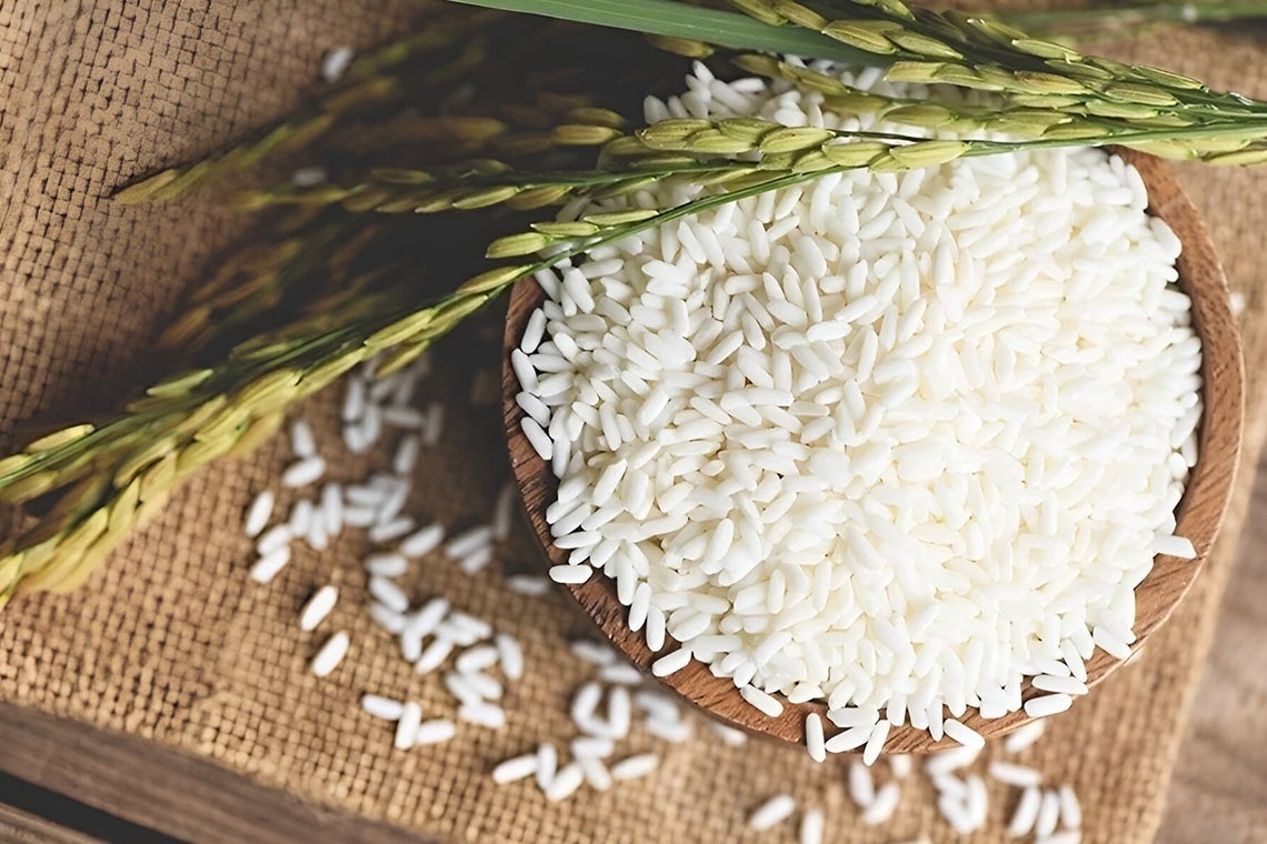 a man and a woman are paddling kayaks on a lake