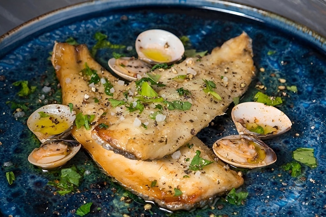 a man and a woman are paddling kayaks on a lake