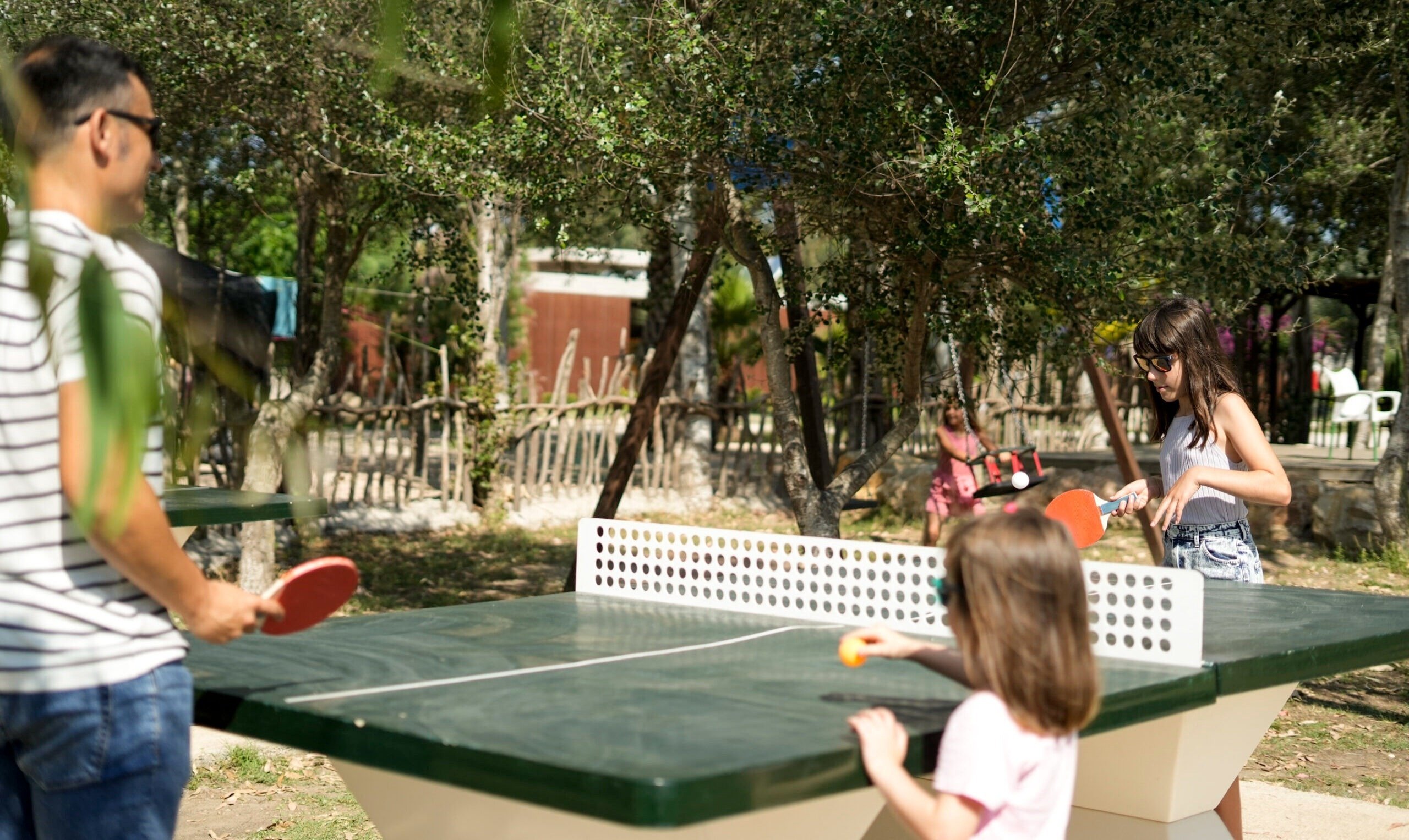 a group of people are riding exercise bikes underwater